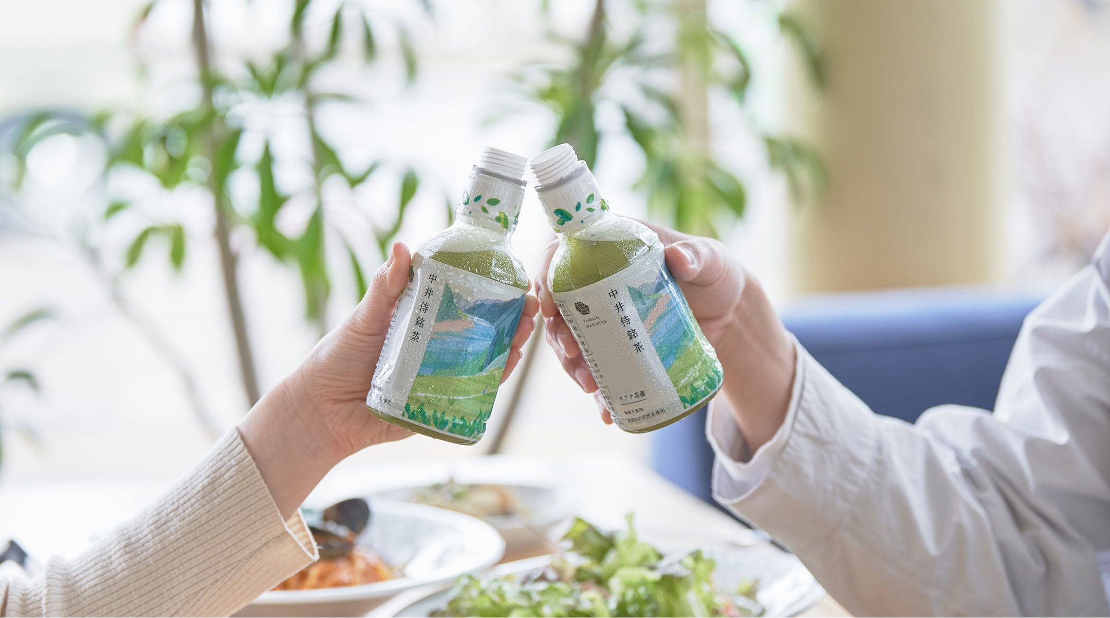 A scene of people toasting with Nakai Samurai Premium Tea at the dining table